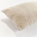Corner detail of Elias Pillow showing fabric texture and piping color contrast