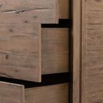 Detailed view of multiple open drawers showing groove-free interior with oak wood finish
