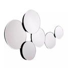 Century Mirror angled side view showing raised centers and thick edges of circular mirrors