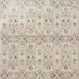 Theia Granite / Ivory Rug with neutral geometric and floral motifs, subtle pile height variation, and a refined fringe border