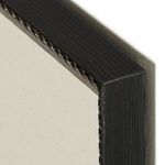 Close-up of black Brimfield frame detailing natural distressed texture