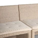 Detail of seat and backrest cushions showing tufted fabric texture