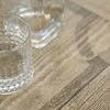 Detailed macro shot of weathered flaky white wood texture on Ciao Bella table