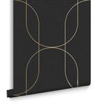 Rolled wallpaper showing close-up of gold curved lines on black textured backdrop with side view of pattern repeat