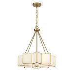Warm brass pendant displaying starburst glass panes with soft illumination from inside