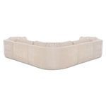 Side view highlighting sectional's rounded back corners and continuous smooth texture