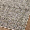 Angled view emphasizing subtle pattern and mix of earth and charcoal tones in Soho Pebble Charcoal rug