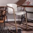 Chiavari Counter Chair in a styled room setting with wooden floor, rug, and industrial desk