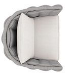 Top-down view of chair highlighting thick cushions inside rounded braided frame