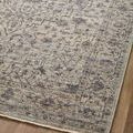 Close-up angled corner showing muted dark border and detailed woven pattern of the Sorrento Mist Charcoal rug