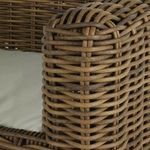 Close-up of tightly woven wicker pattern with smooth, rounded strands and natural color