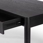 Side close-up emphasizing the texture and finish of black oak wood