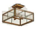 Square semi-flush mount with visible bulbs inside and textured glass viewed slightly from below