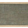 Top down view revealing the tightly woven seagrass texture on the tabletop