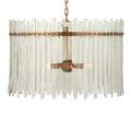 Close-up of hammered glass bars showcasing subtle irregularities and warm brass mounting strip
