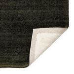 Side view of the darker Blanton Outdoor Rug showing edge stitching and texture
