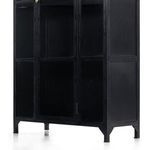 Black metal cabinet door slightly ajar, empty shelves visible inside, angled on white background