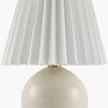 Ferez accent table lamp with round beige ceramic base and white pleated linen shade