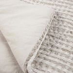 Close-up of quilt showing soft pre-washed cotton-linen blend backing and textured waffle weave front