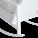 Close-up of lower rear corner and rocker base showing frame finish and cushion edge