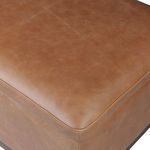Close-up view of top corner and leather surface showing fine stitch details