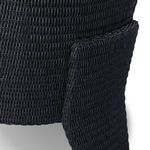 Detailed close view of chunky wicker weave on side leg with three-leg design visible