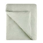 Folded duvet showing soft linen texture and stitching detail on edges