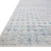Close-up side angle showing low pile height and subtle texture of Kamala Sky Dove rug