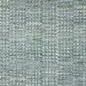 Muted blue-green traditional rug with a geometric architectural pattern and soft texture
