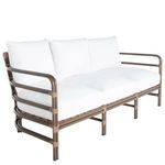 Rear view of oak frame sofa with white cushions, showcasing horizontal slats and wrap joints