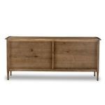 Close-up of rounded lip edge and solid wood corner on dresser top