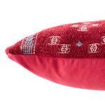 Close-up side angle focusing on detailed embroidery and texture of darker red wool weave