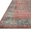 Close-up angled view showing fiber texture and worn effect of the rug corners