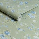 Close-up of rolled Rachel Ashwell Wildflower wallpaper showing paper texture and floral pattern continuity