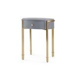Round Bodrum side table with brushed brass base and textured heavy linen gray lacquered top and drawer