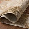 Rolled edge of the rug highlighting tight weave and combination of polypropylene and polyester fibers