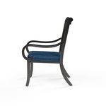 Monterey Dining Chair side profile showing curved armrests and frame finish with blue cushion