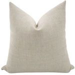 Square pillow cover in soft alabaster beige polyester fabric with subtle woven texture and plump shape