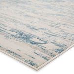 Close-up of Celil Abstract Ivory/Blue Rug showing low-pile texture and color blending detail