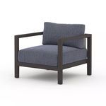 Sonoma Outdoor Chair in bronze frame with blue textured cushions and modern angular design
