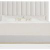 Cascade bed front view emphasizing vertical channel details on headboard and light taupe upholstery