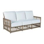 Newport Burlap Woven Sofa with light brown wicker frame and white cushions, three-seat outdoor design