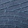 Close-up of blue embroidered linear pattern texture on woven cotton pillow cover