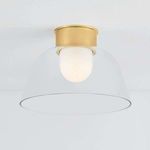 Lakeside Flush Mount glowing softly from lit inner diffuser, side view against white ceiling