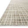 Angled close-up showing Urbana Taupe Rug's pile texture and the raised grid pattern on taupe background