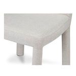 Close-up of upholstery on chair seat corner showing texture and stitching detail