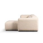 Radley sectional side profile showing low backrest and chaise upholstery texture