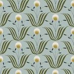 ash blue wallpaper with large stylized green leaves and circular cream and tan floral motifs in repeating pattern