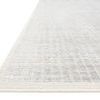 low angle close-up showing soft texture and woven border detail of the Beverly Silver Sky Rug