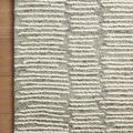 Close-up corner view on wood floor highlighting depth and wool fibers